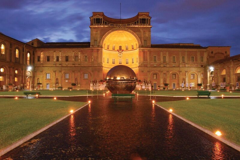 Twilight at Vatican courtyard with Sphere sculpture.